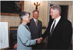 Susan Loy + Ron Ayers with President Clinton